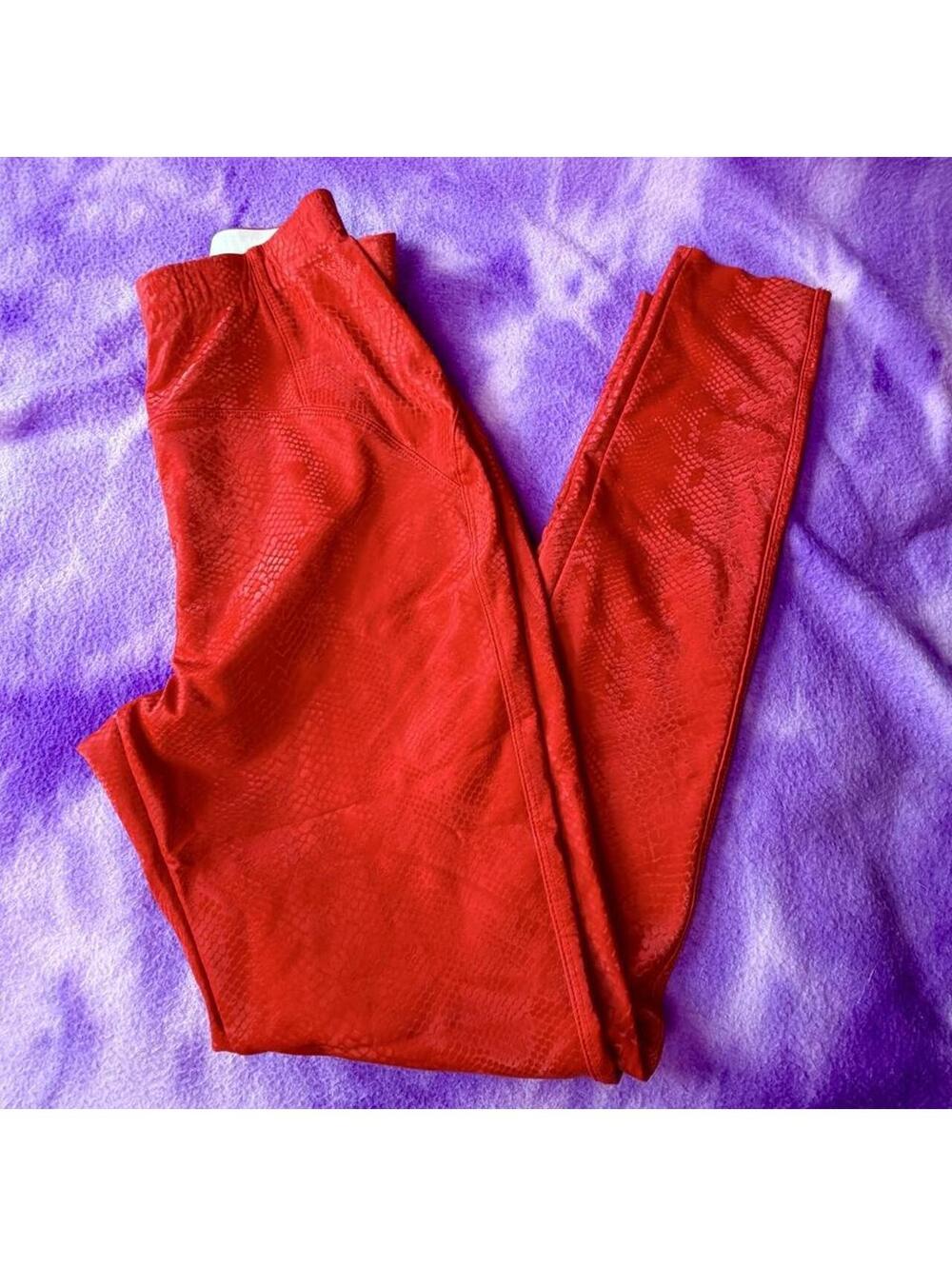 Akira red snake leggings.